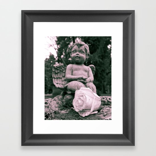 Cherub and rose Framed Art Print