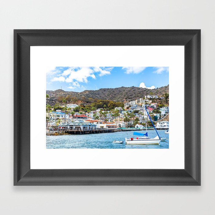 Sailboat with a view of Avalon Framed Art Print
