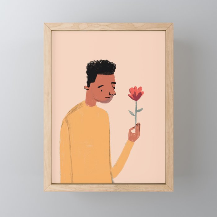 Hopeful Boy with Flower Framed Mini Art Print