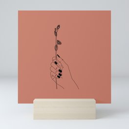 HOLDING ON A FLOWER Mini Art Print