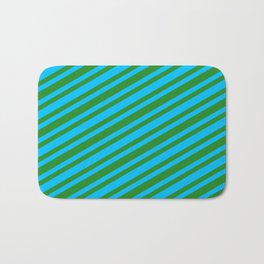 [ Thumbnail: Forest Green and Deep Sky Blue Colored Pattern of Stripes Bath Mat ]