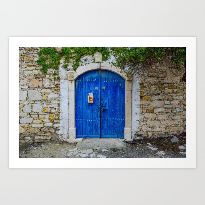 Blue French rustic doors with green ivy growing over cobblestone walls color photograph art print Art Print