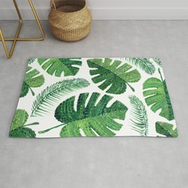 Monstera leaves and palm leaves Rug