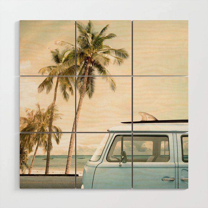Vintage car parked on the tropical beach (seaside) with a surfboard on the roof Wood Wall Art