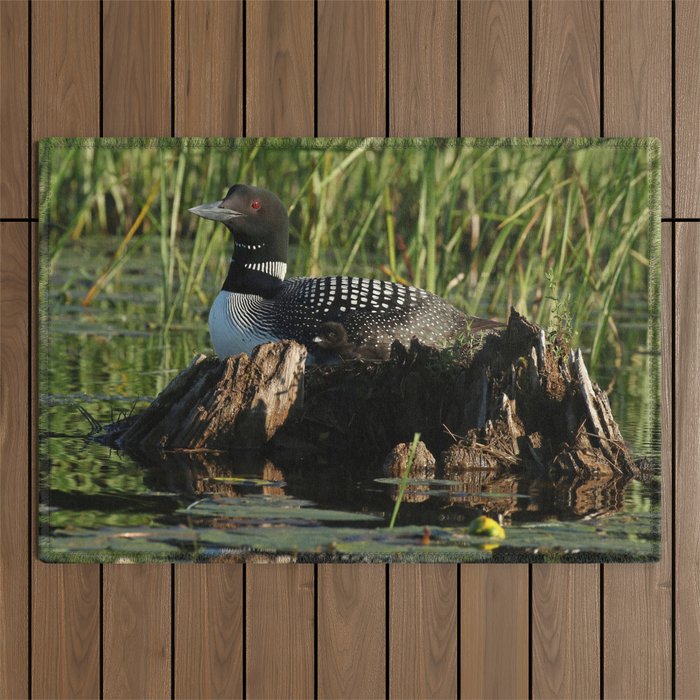 Proud mother loon Outdoor Rug