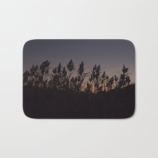 Phragmites silhouette at sunset Bath Mat