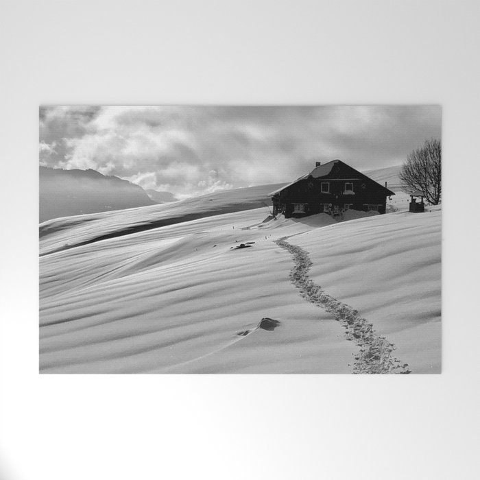 Snowcapped alpine mountain cottage - cabin winter landscape black and white photograph - photography - photographs Welcome Mat