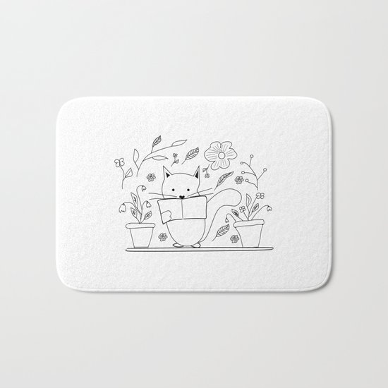 Cat between the flowers Bath Mat