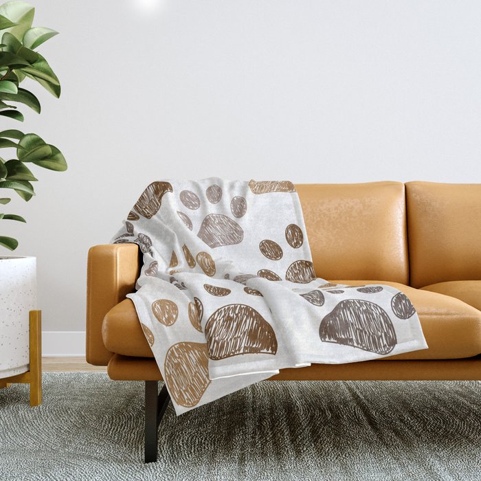 Brown colored paw print background Throw Blanket by gulsengunel