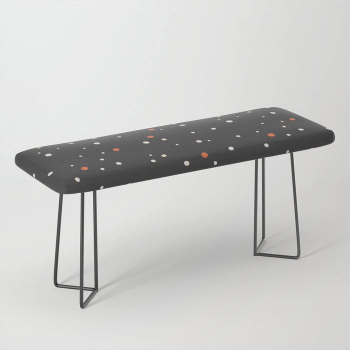 Abstract orange and white polka dots on dark grey Bench