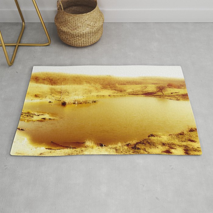 Lakescape of gold Rug