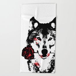 Wolf blood stained, holding a red rose. Beach Towel
