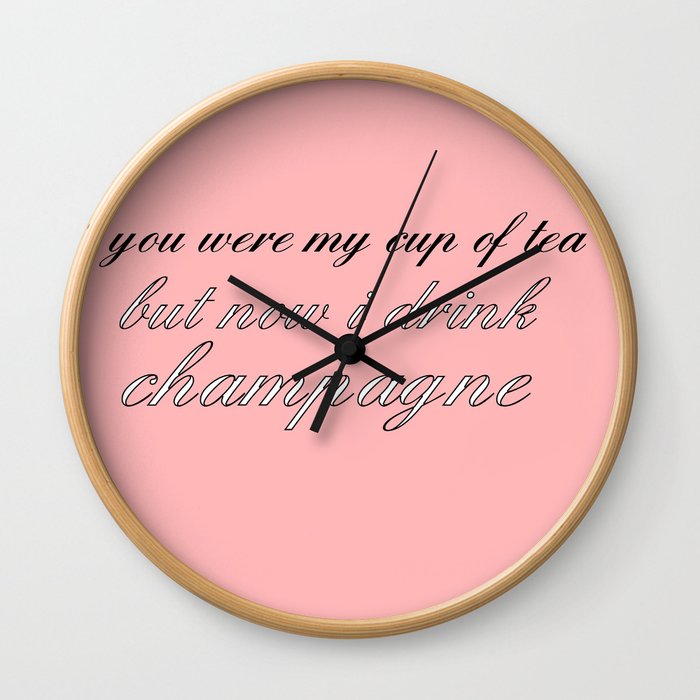 now I drink champagne Wall Clock