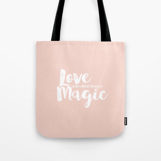 LOVE is the closest think to magic - Saying on peach background - on #Society6 Tote Bag