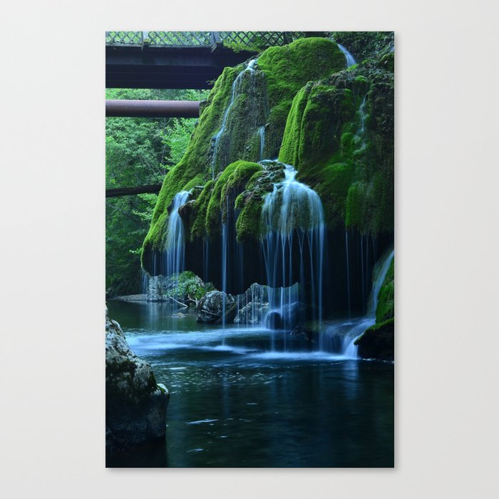 Color time-lapse photograph of waterfalls in mossy rock formation below trestle railroad bridge river nature photography - photographs Canvas Print
