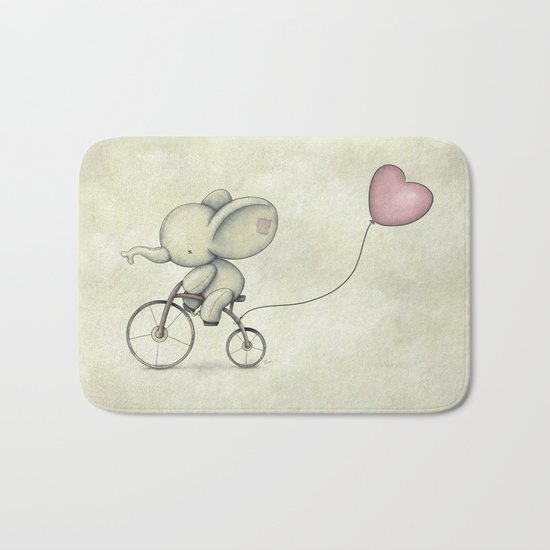 Cute Elephant riding his bike Bath Mat