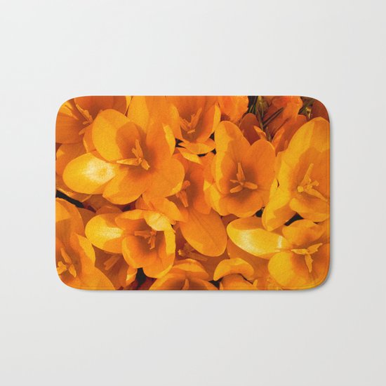 Gold in the garden Bath Mat