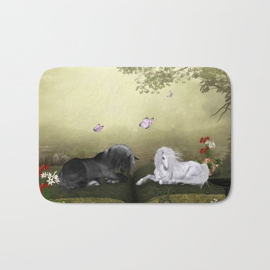 Wonderful white unicorn with black horse Bath Mat