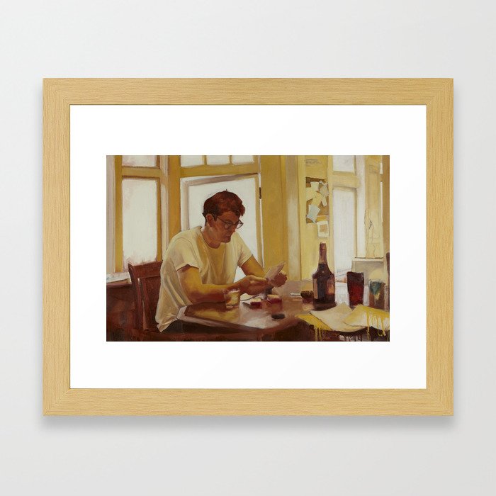 Warm portrait of a man reading Framed Art Print