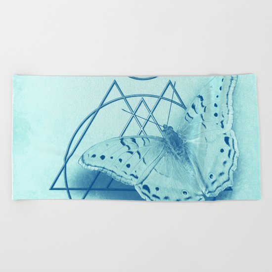 Butterfly in an abstract landscape Beach Towel