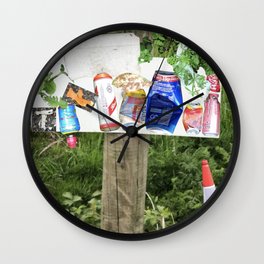 Rubbish and Cans on a post with a bollard in the countryside Wall Clock