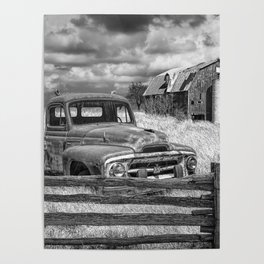 Black and White of Rusted International Harvester Pickup Truck behind wooden fence with Red Barn in Poster