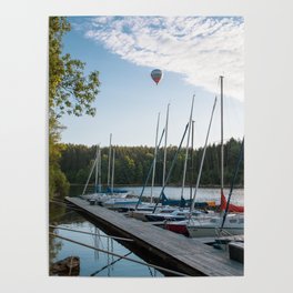 Hot Air Balloon floating over a pier  Poster
