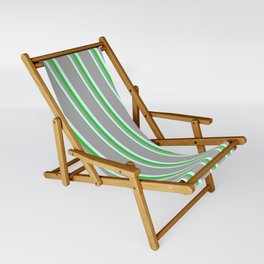 [ Thumbnail: Dark Gray, Light Cyan, and Lime Green Colored Lines Pattern Sling Chair ]