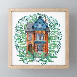 magic  victorian house and green leaves on white background  Framed Mini Art Print