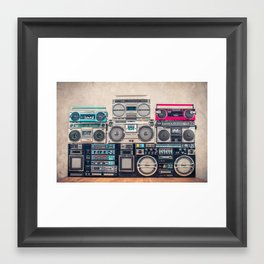 Retro old school design ghetto blaster stereo radio cassette tape recorders boombox tower from circa 1980s front concrete wall background. Vintage style filtered photo Framed Art Print