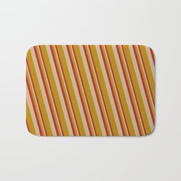 [ Thumbnail: Red, Tan, and Dark Goldenrod Colored Lined Pattern Bath Mat ]