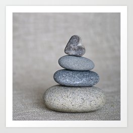 Balanced pebble stack with heart on top Art Print
