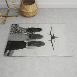 Sisters stand united; airplane coming in for a landing head on at three women sisterhood girl power black and white photograph - photography - photographs Area & Throw Rug