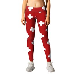 White Swiss Cross Pattern on Red background Leggings