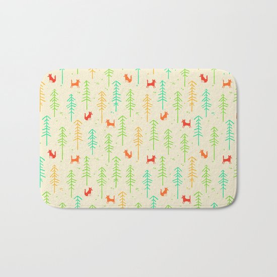 Foxes hiding in the forest Bath Mat