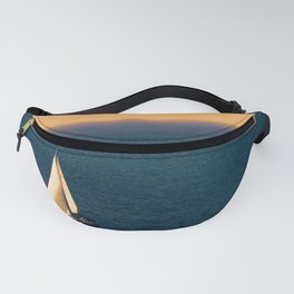 Sunset sea and sail boat Fanny Pack