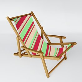 [ Thumbnail: Bisque, Green, and Crimson Colored Striped/Lined Pattern Sling Chair ]