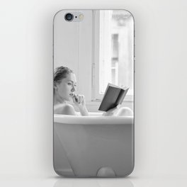 Reading Tolstoy on the riviera; young blond woman in bathtub reading novel, book, portrait black and white photograph - photography - photographs iPhone Skin