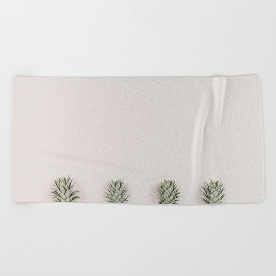 Pineapples in a Row Beach Towel