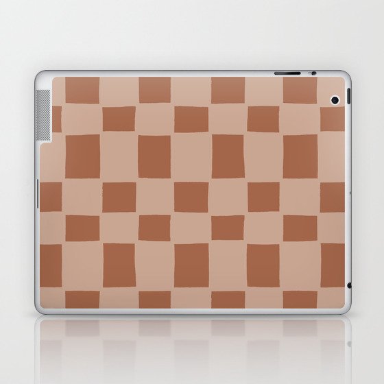 Tipsy checker in terracotta Laptop & iPad Skin