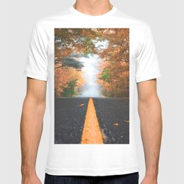 GRAY CONCRETE ROAD BETWEEN BROWN AND GREEN LEAF TREES AT DAYTIME T-shirt
