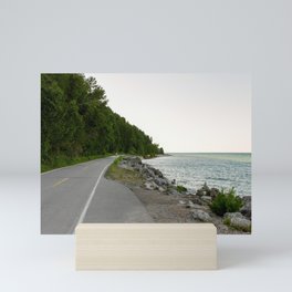 Lake Michigan and a Bicycle only Highway on Mackinac Island Mini Art Print