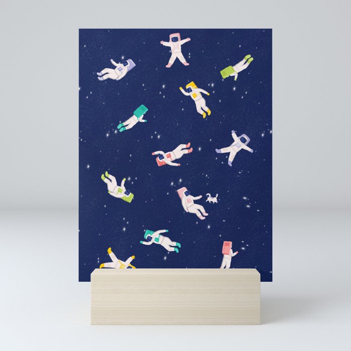 Colourful Astronauts Floating in Space Mini Art Print