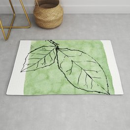 Two Leaves on Green Rug