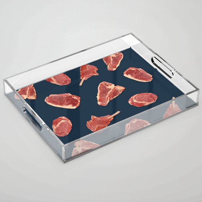 Pattern of fresh beef steaks over blue Acrylic Tray