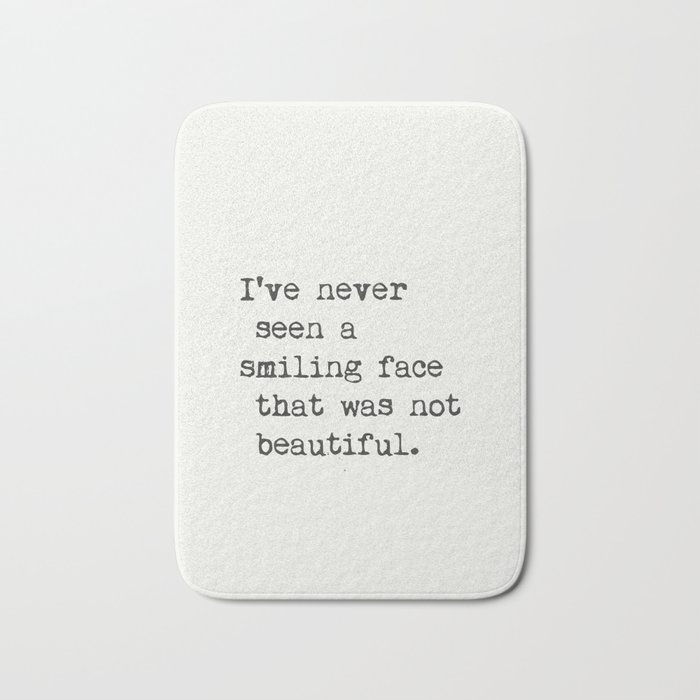 I’ve never seen a smiling face that was not beautiful. Bath Mat