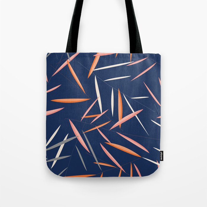 Colored leaves in a dark blue background Tote Bag