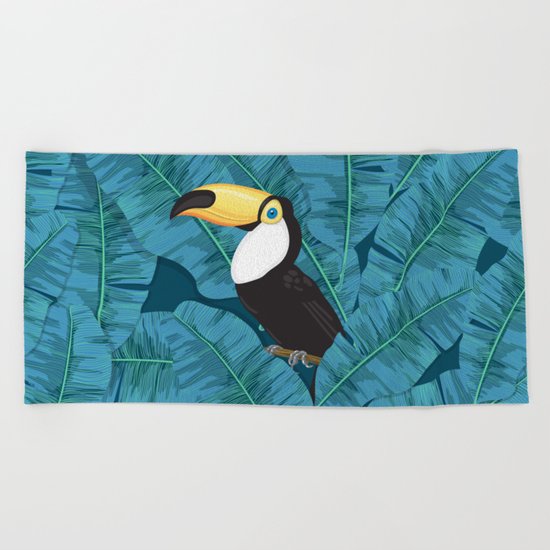 Toucan and banana leaves in blue Beach Towel