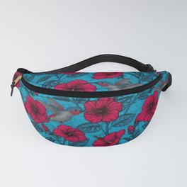 Red hibiscus and hummingbirds, tropical garden on light blue Fanny Pack