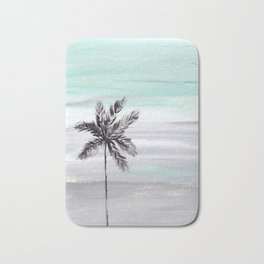 palm tree silhouette against a teal and grey sky Bath Mat